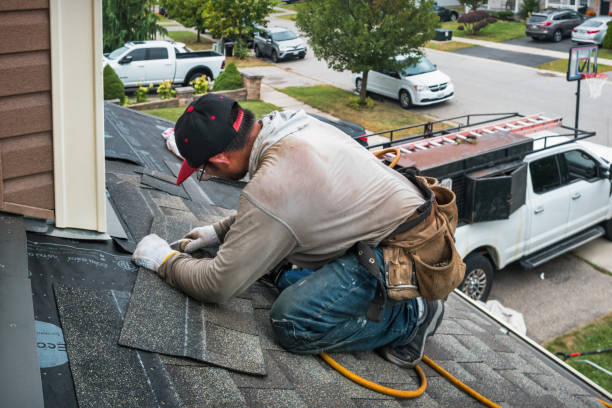 Professional Gutter Repair And Installation technician working in Falmouth, MI
